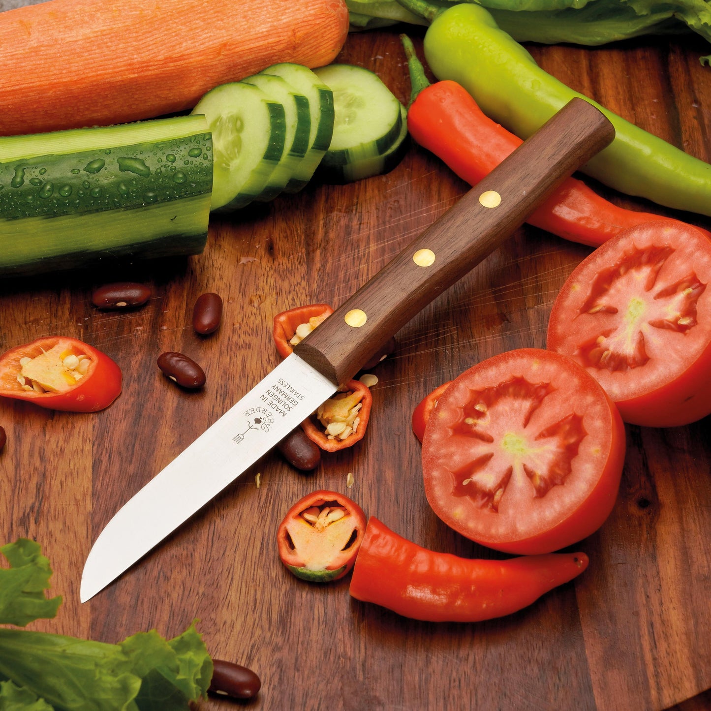 Frühstücksmesser Buckelsmesser aus Solingen mit Walnuss Holzgriff und Gravur Herder – traditionelles Solingen Messer für Brot und Frühstück
