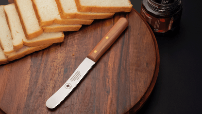 Buckelsmesser Brotmesser Brötchenmesser mit Kirschholzgriff und Wellenschliff – Solinger Qualitätsmesser